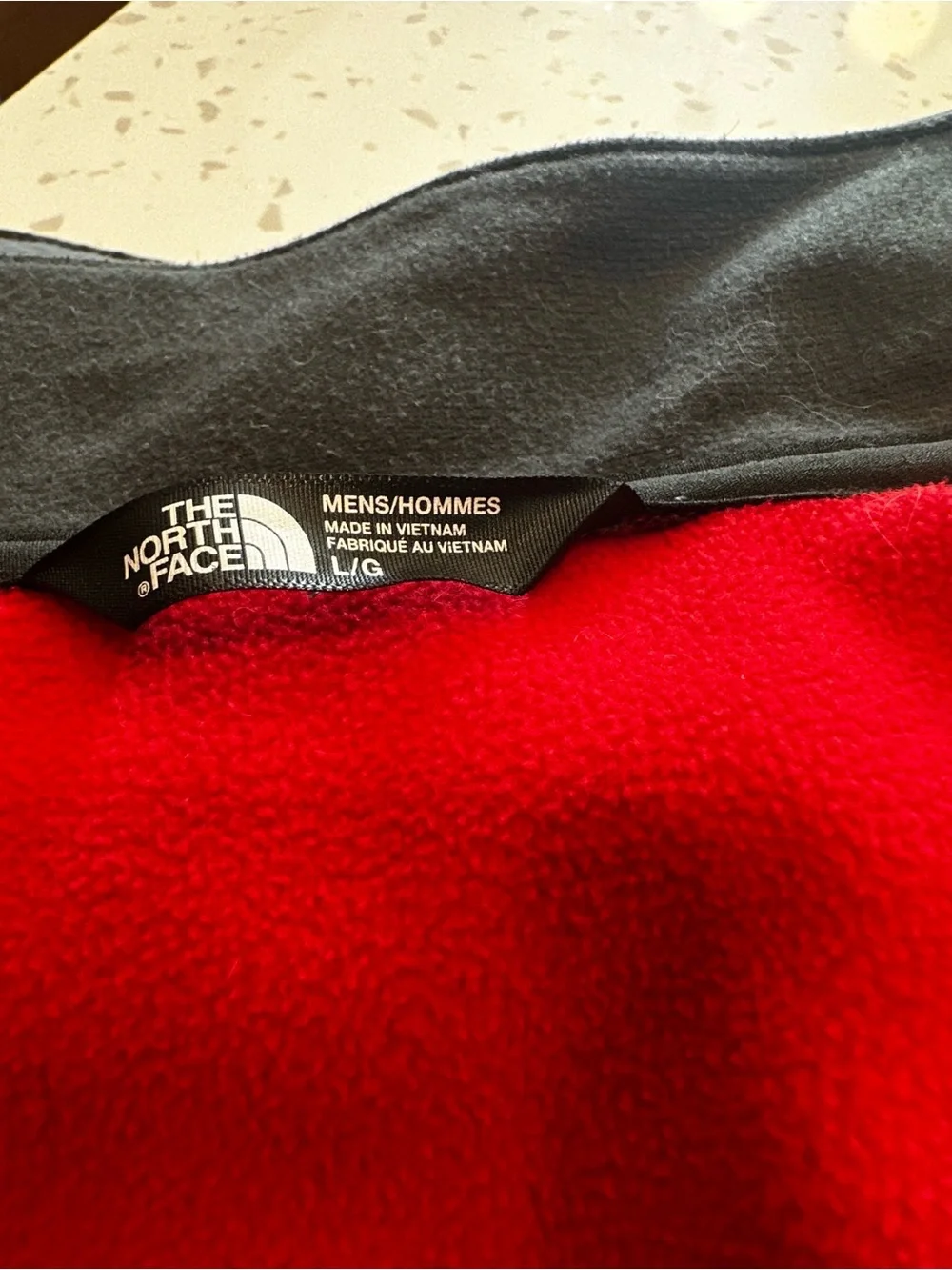 The North Face Men's Gray Softshell Jacket with Red Lining
